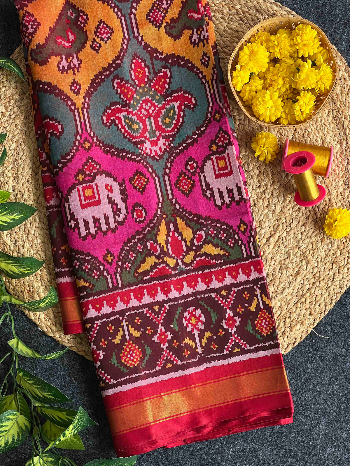 Multiple colours big motifs design with Red flowers bordar Pallu premium single ikkat Patola silk Saree