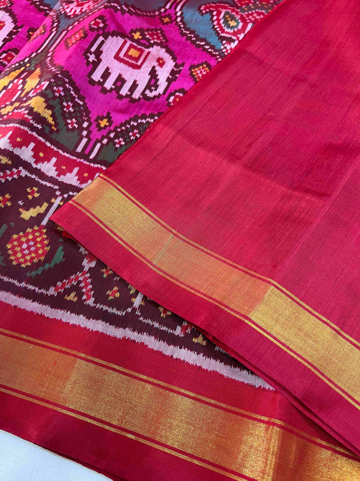 Multiple colours big motifs design with Red flowers bordar Pallu premium single ikkat Patola silk Saree