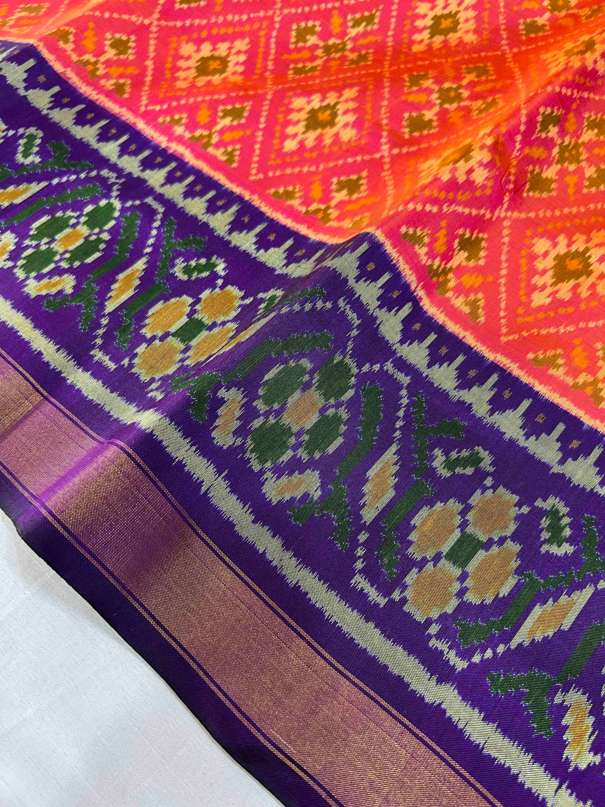 Peach panchnanda design with purple flowers Pallu single ikkat sarees
