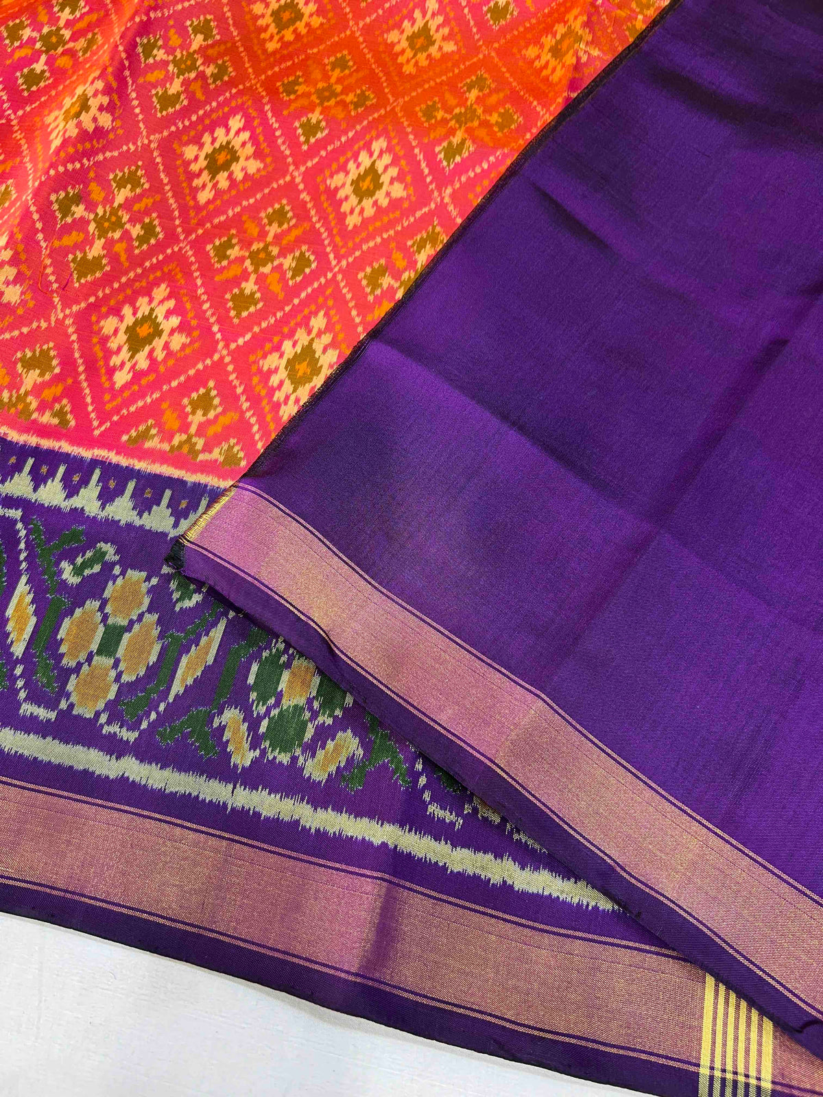 Peach panchnanda design with purple flowers Pallu single ikkat sarees