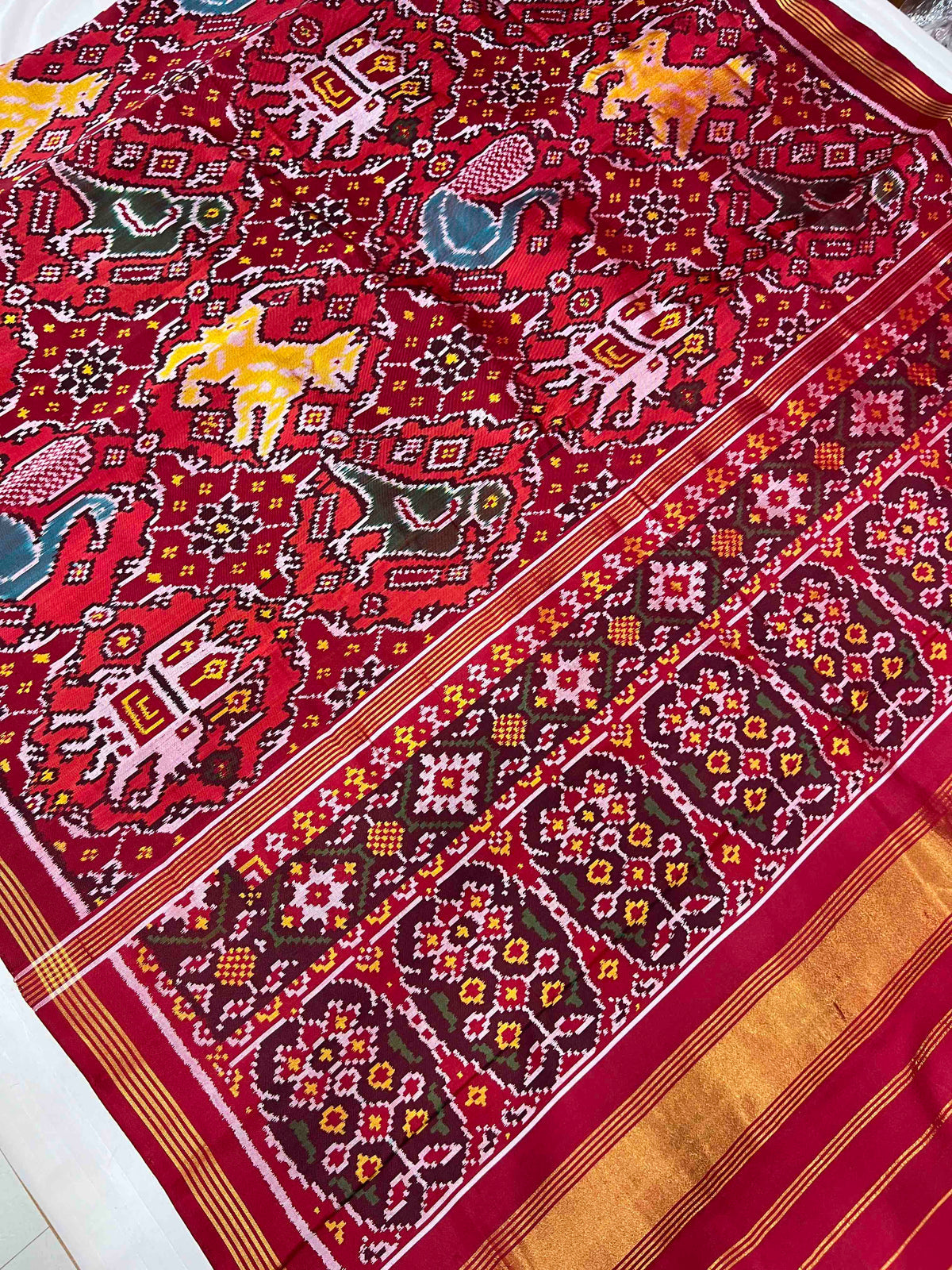 Exclusive 8 figures design with flowers Pallu patola silk sarees