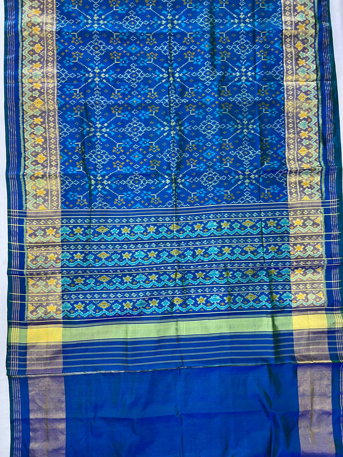 Beautiful Sky blue Navaratan design single ikkat Patola silk Saree