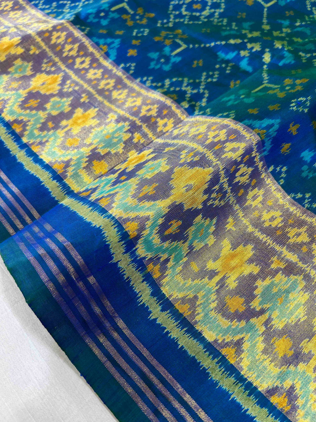 Beautiful Sky blue Navaratan design single ikkat Patola silk Saree