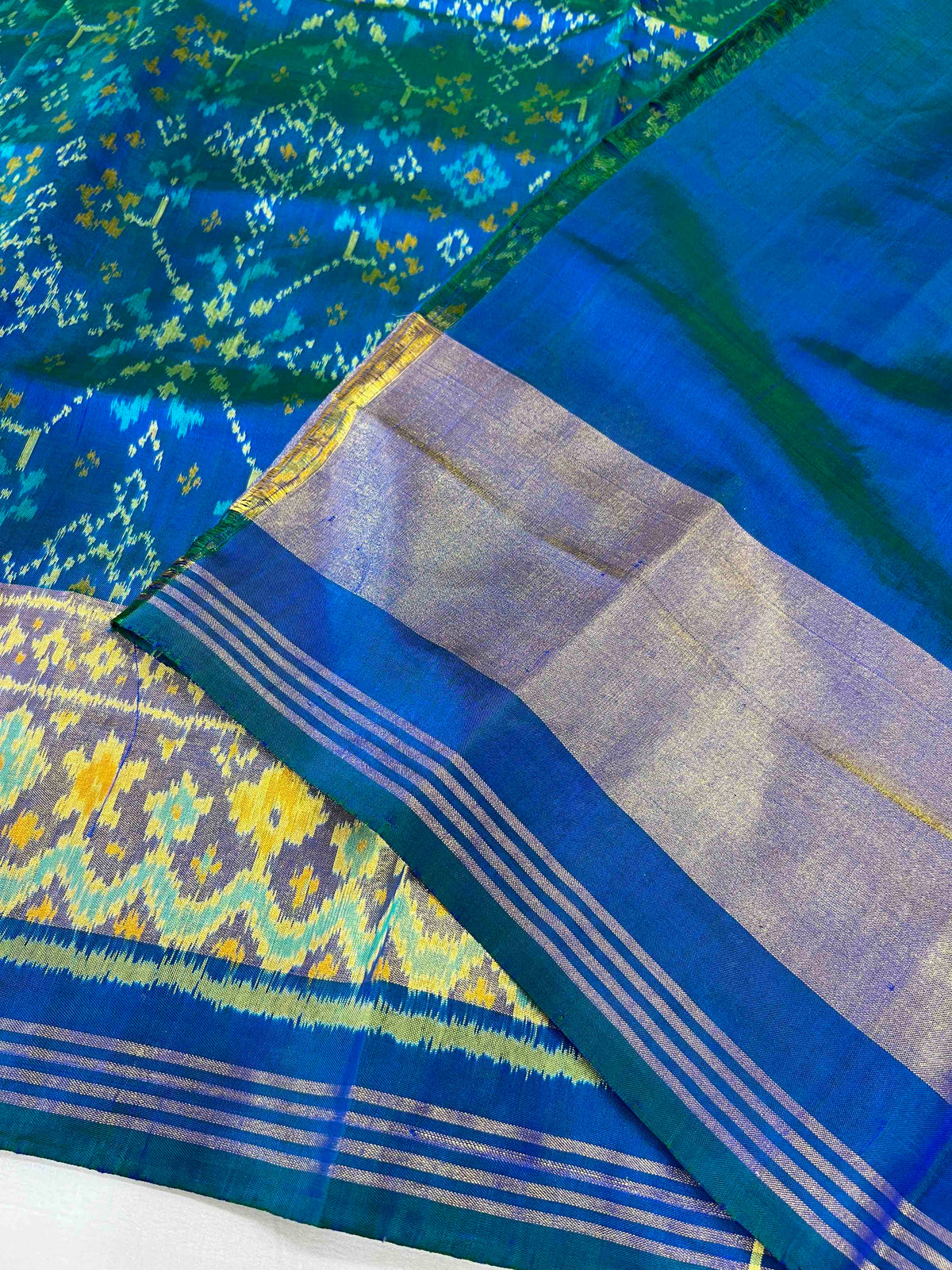 Beautiful Sky blue Navaratan design single ikkat Patola silk Saree