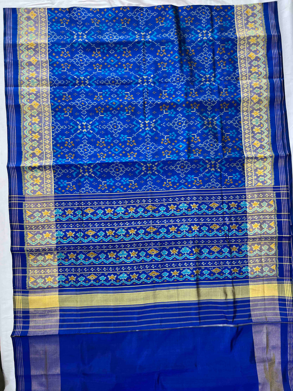 Blue Navratan design single ikkat Patola silk Saree