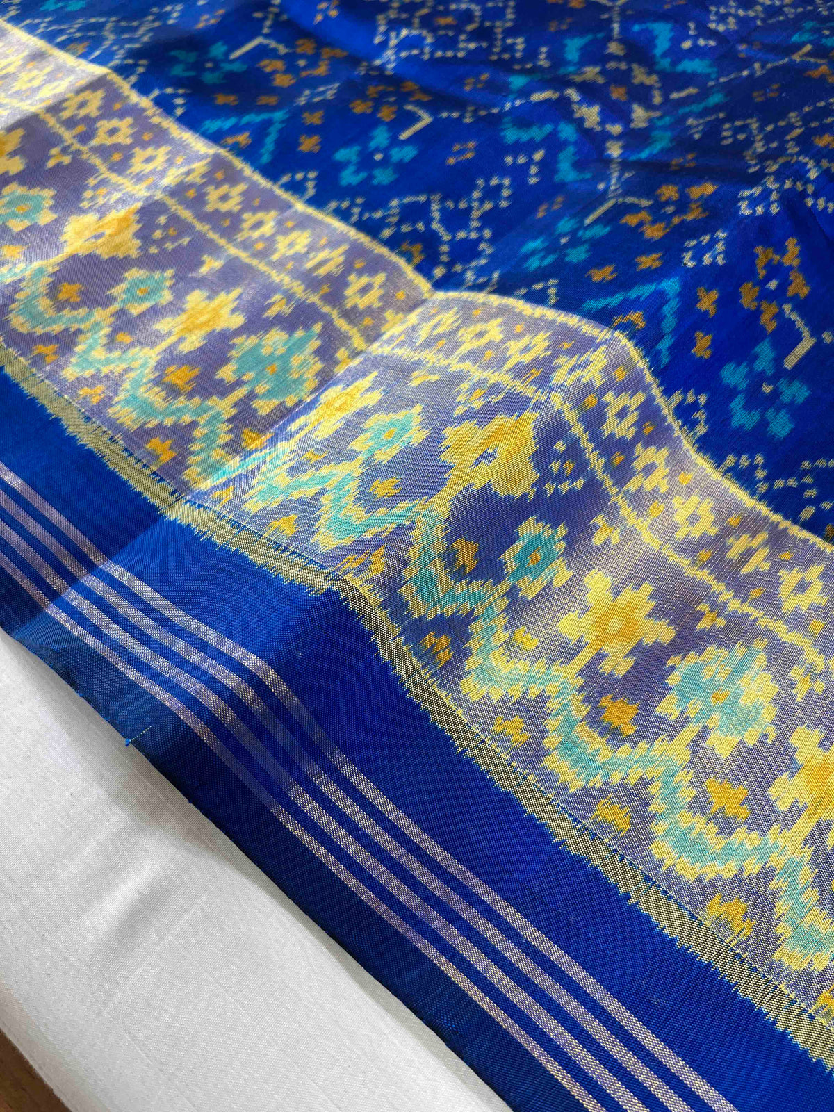 Blue Navratan design single ikkat Patola silk Saree
