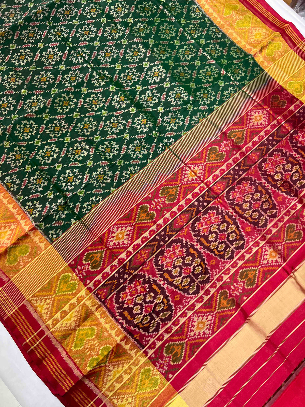 Green panchnanda design with Red flowers Pallu single ikkat Patola silk Saree