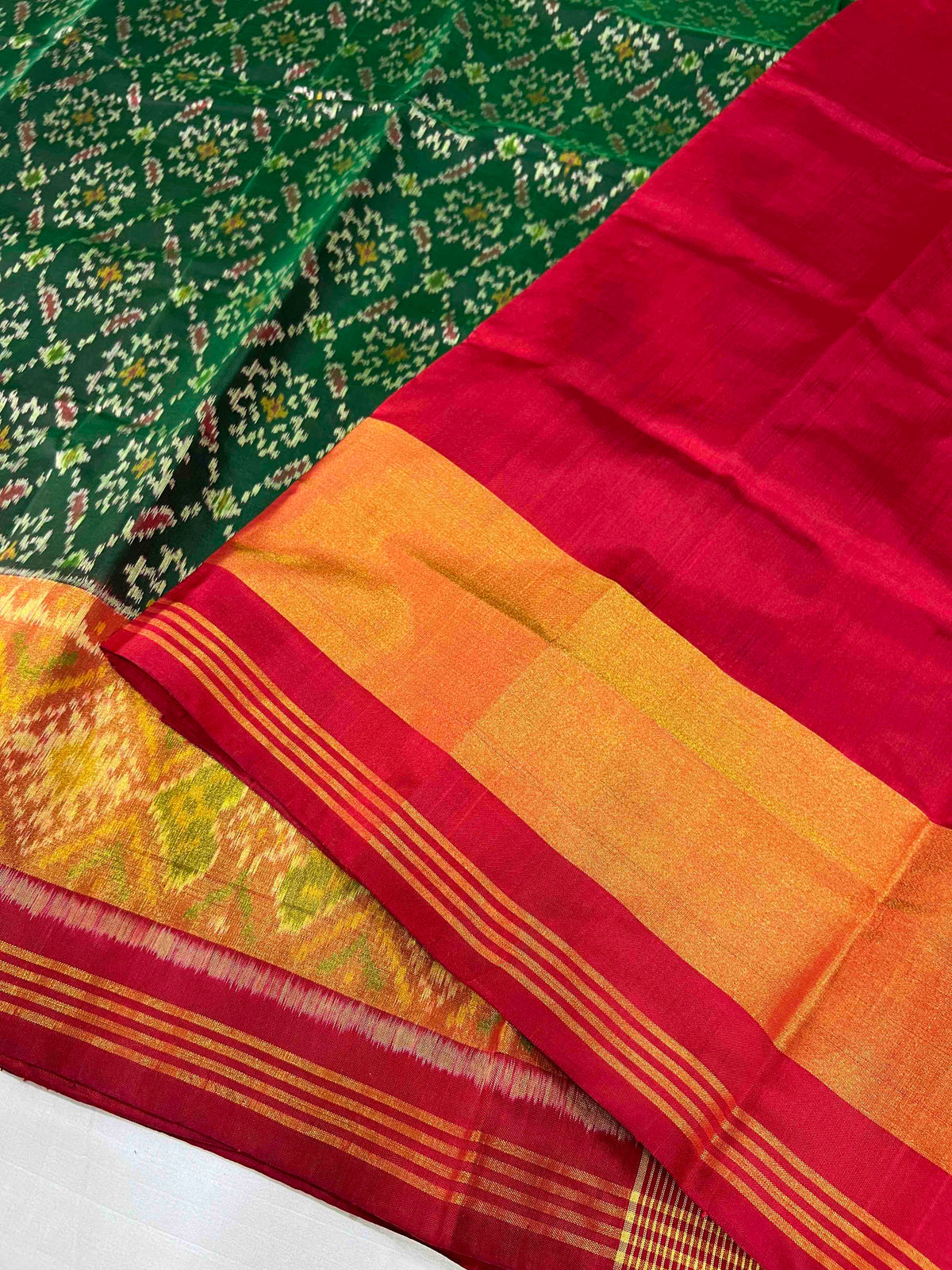 Green panchnanda design with Red flowers Pallu single ikkat Patola silk Saree