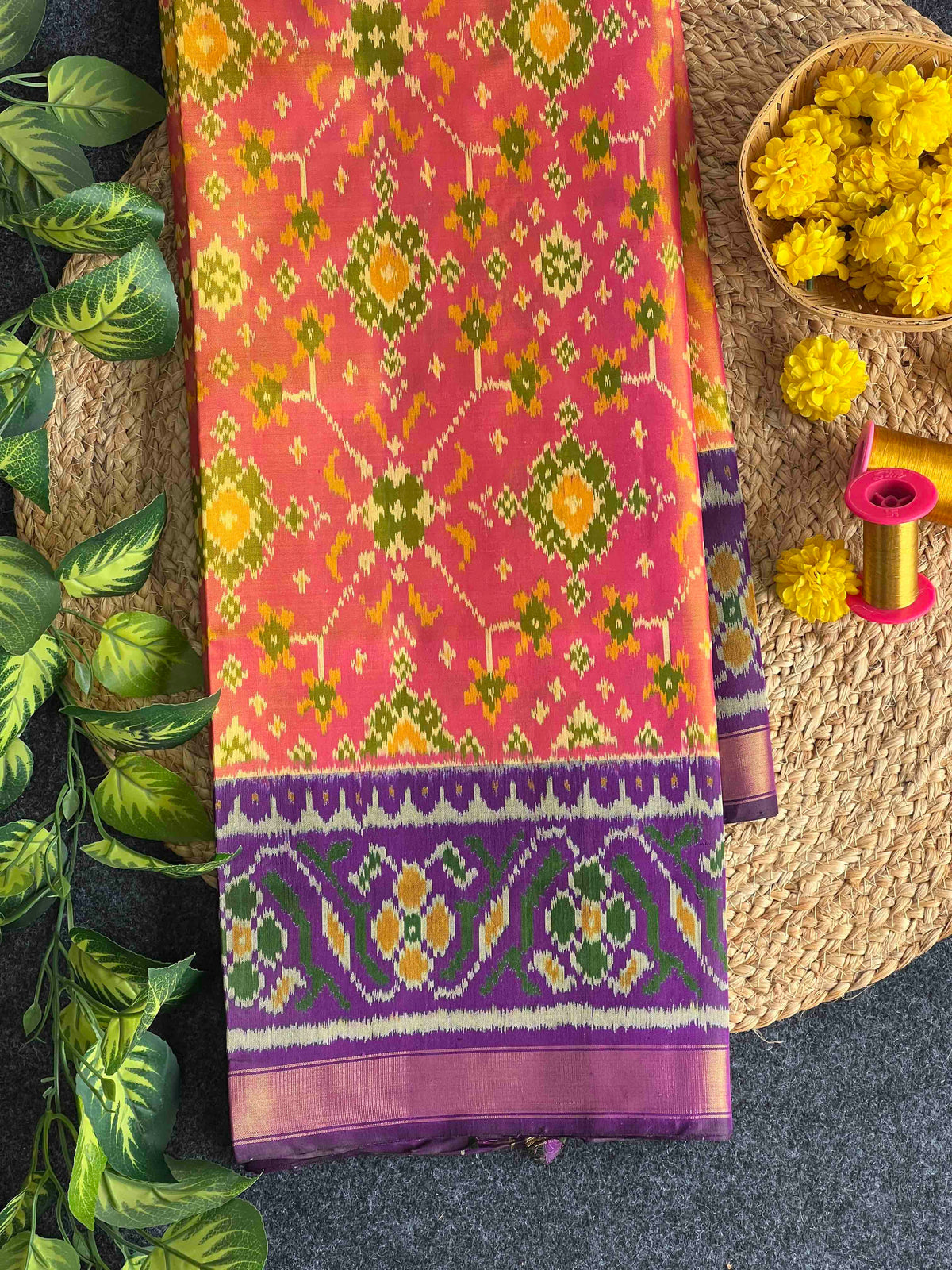 Beautiful peach Navratan with dark purple single ikkat Patola silk Saree