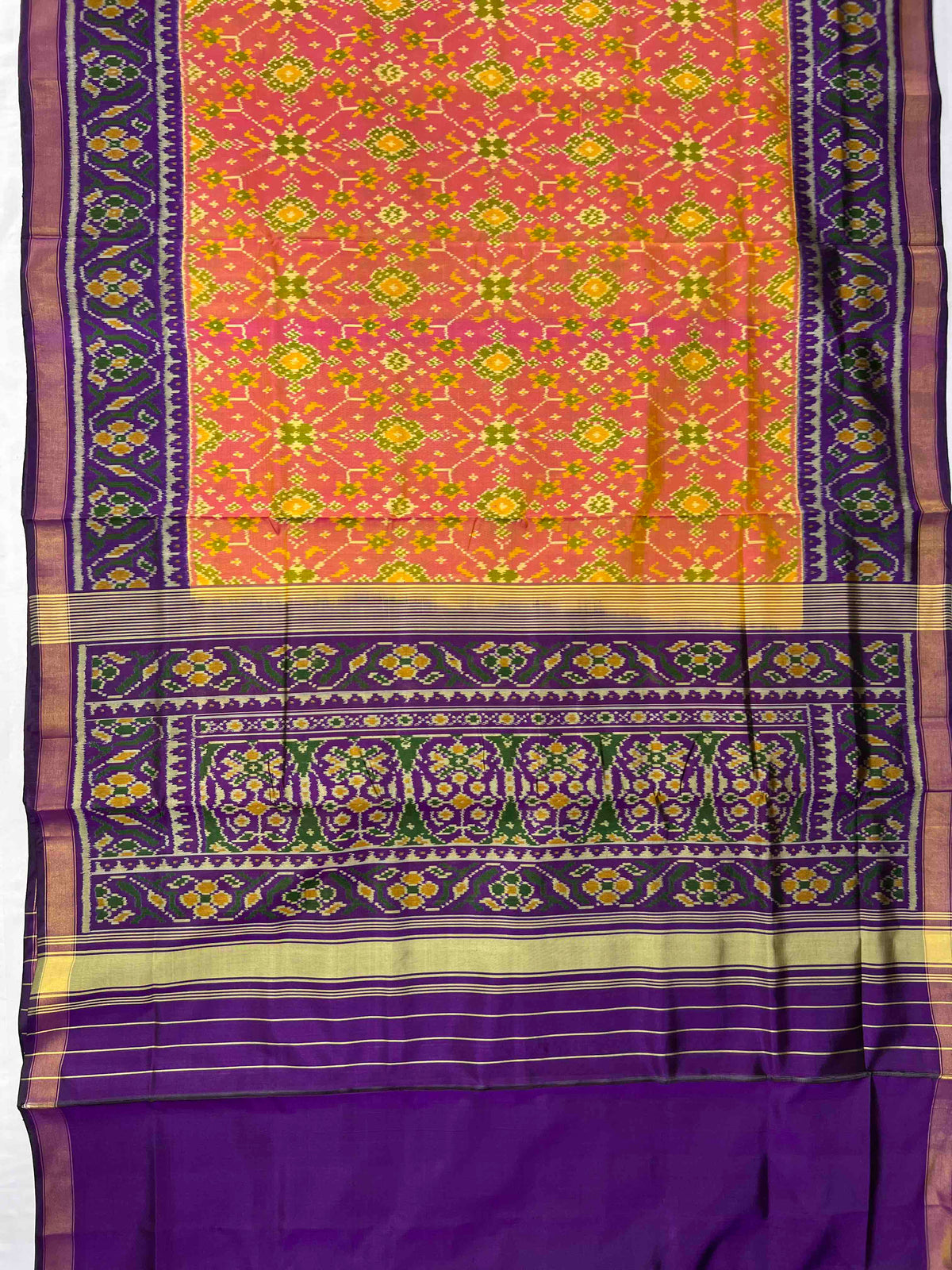 Beautiful peach Navratan with dark purple single ikkat Patola silk Saree