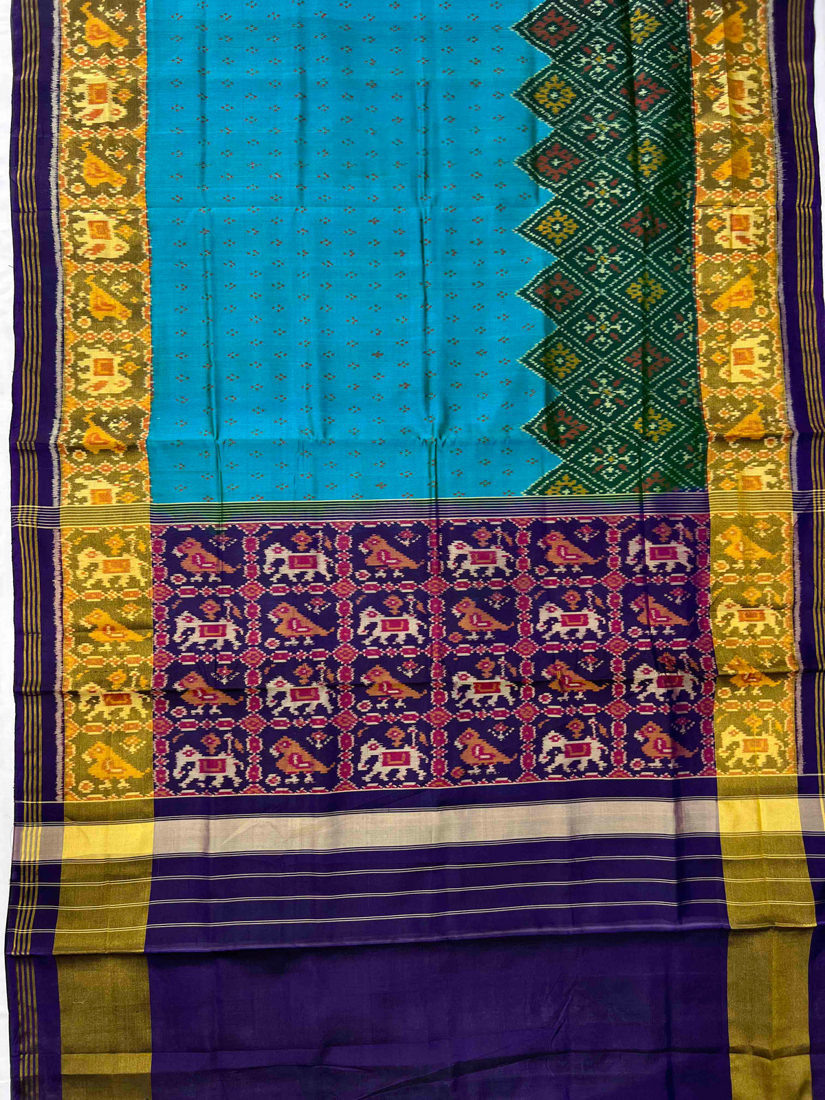Beautiful Green panchnanda skirt with Blue bordar Pallu Patola silk Saree