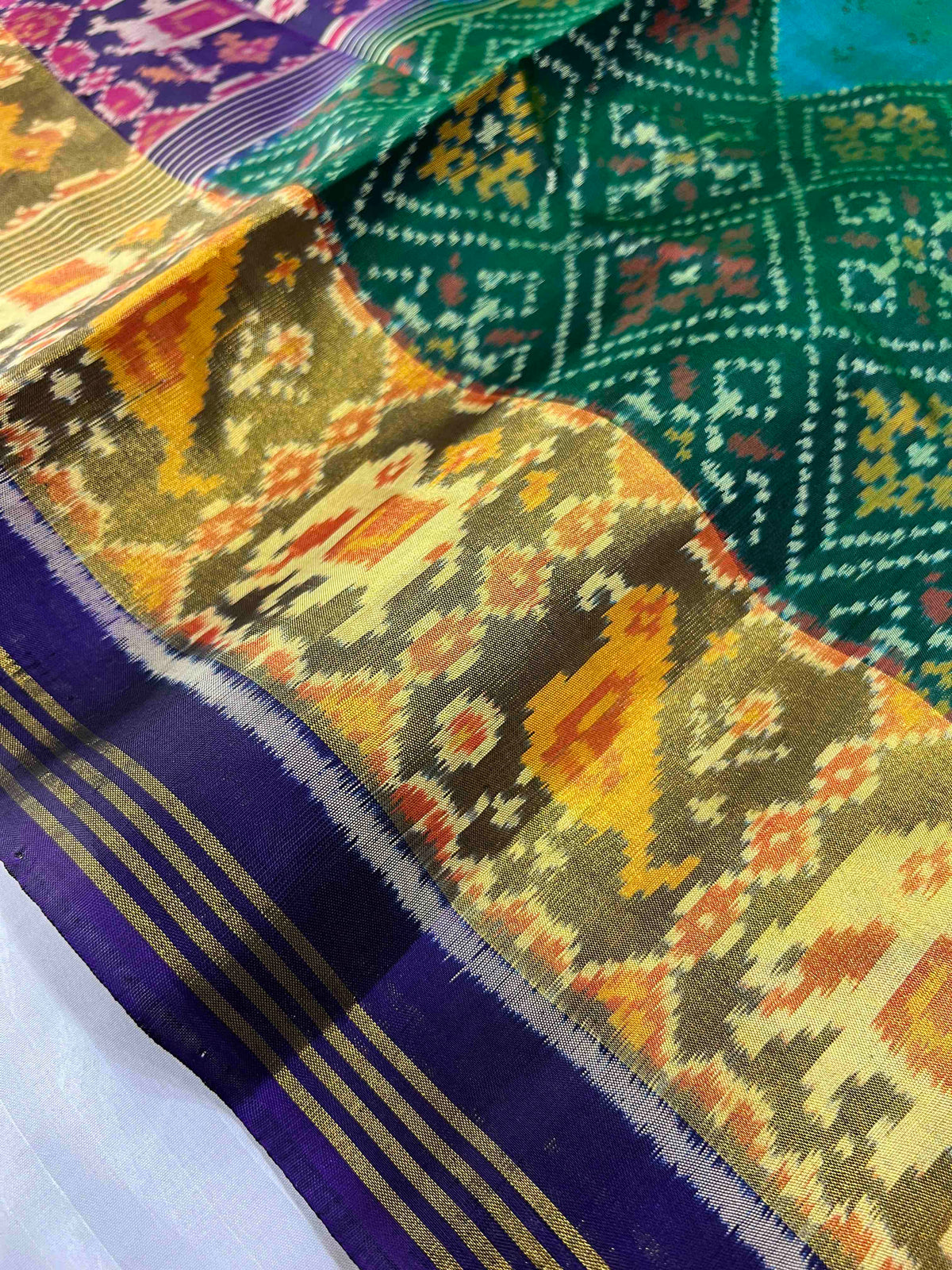 Beautiful Green panchnanda skirt with Blue bordar Pallu Patola silk Saree