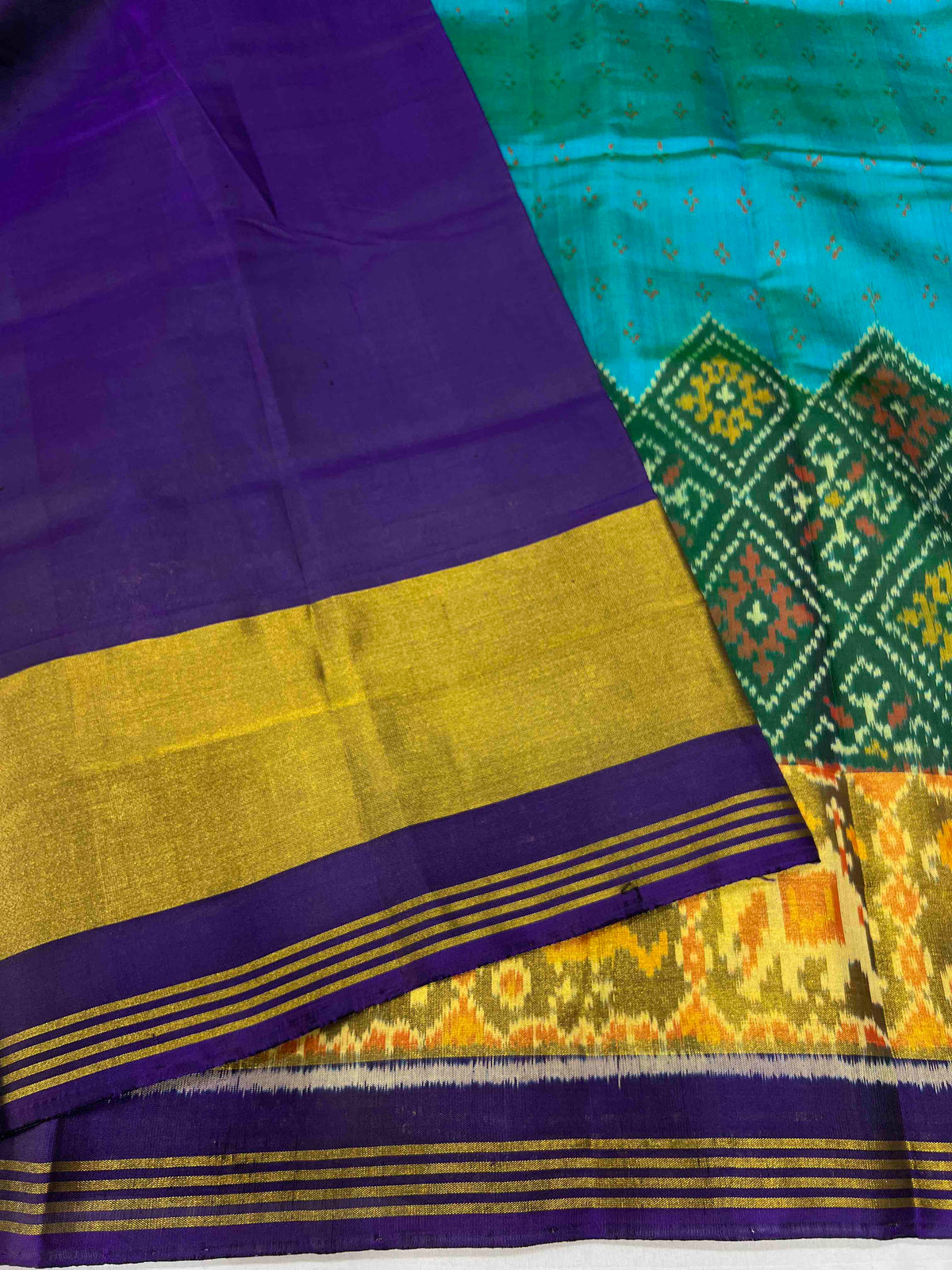 Beautiful Green panchnanda skirt with Blue bordar Pallu Patola silk Saree