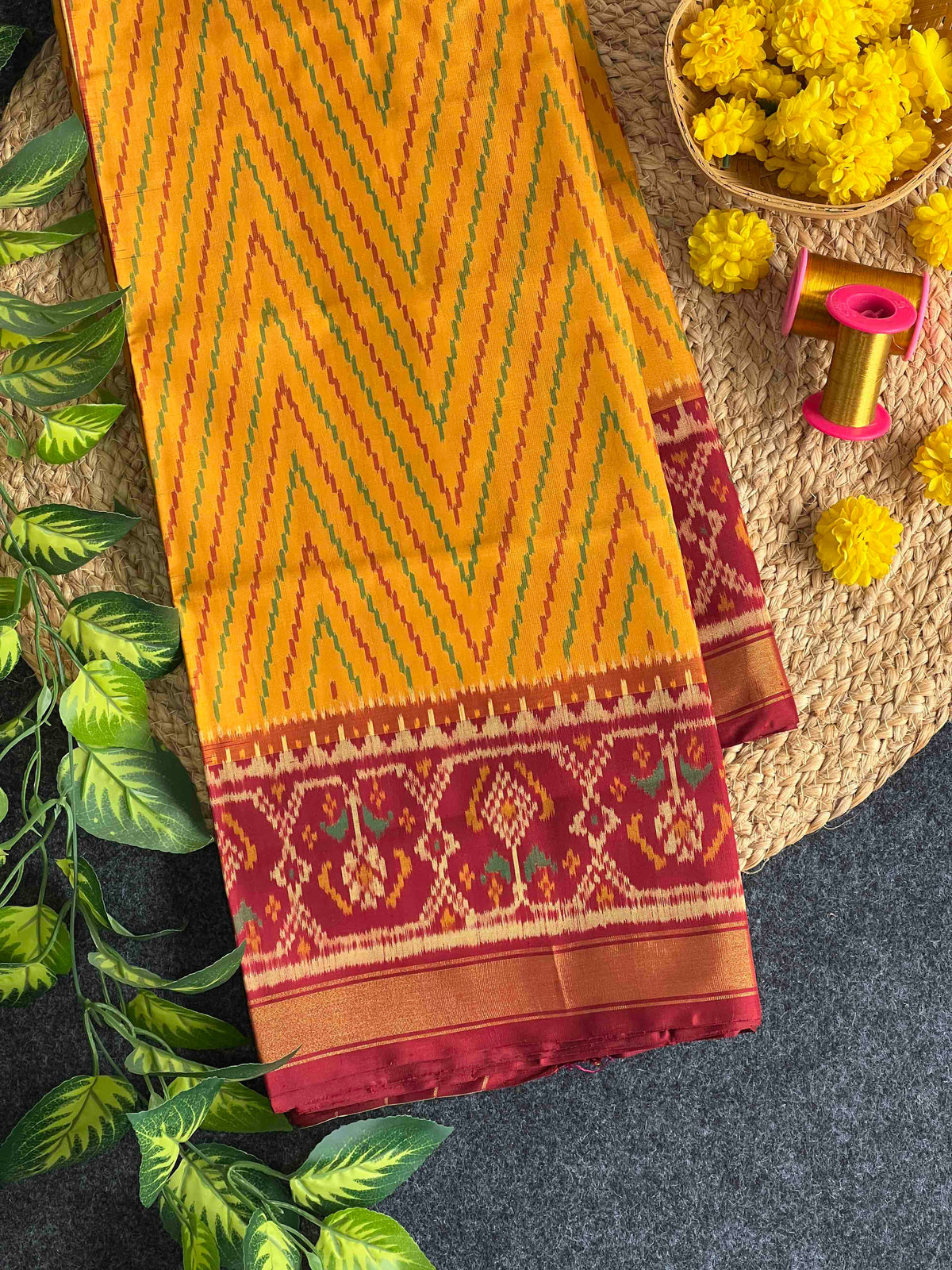 Beautiful yellow laheriya design with red single ikkat Patola silk Saree