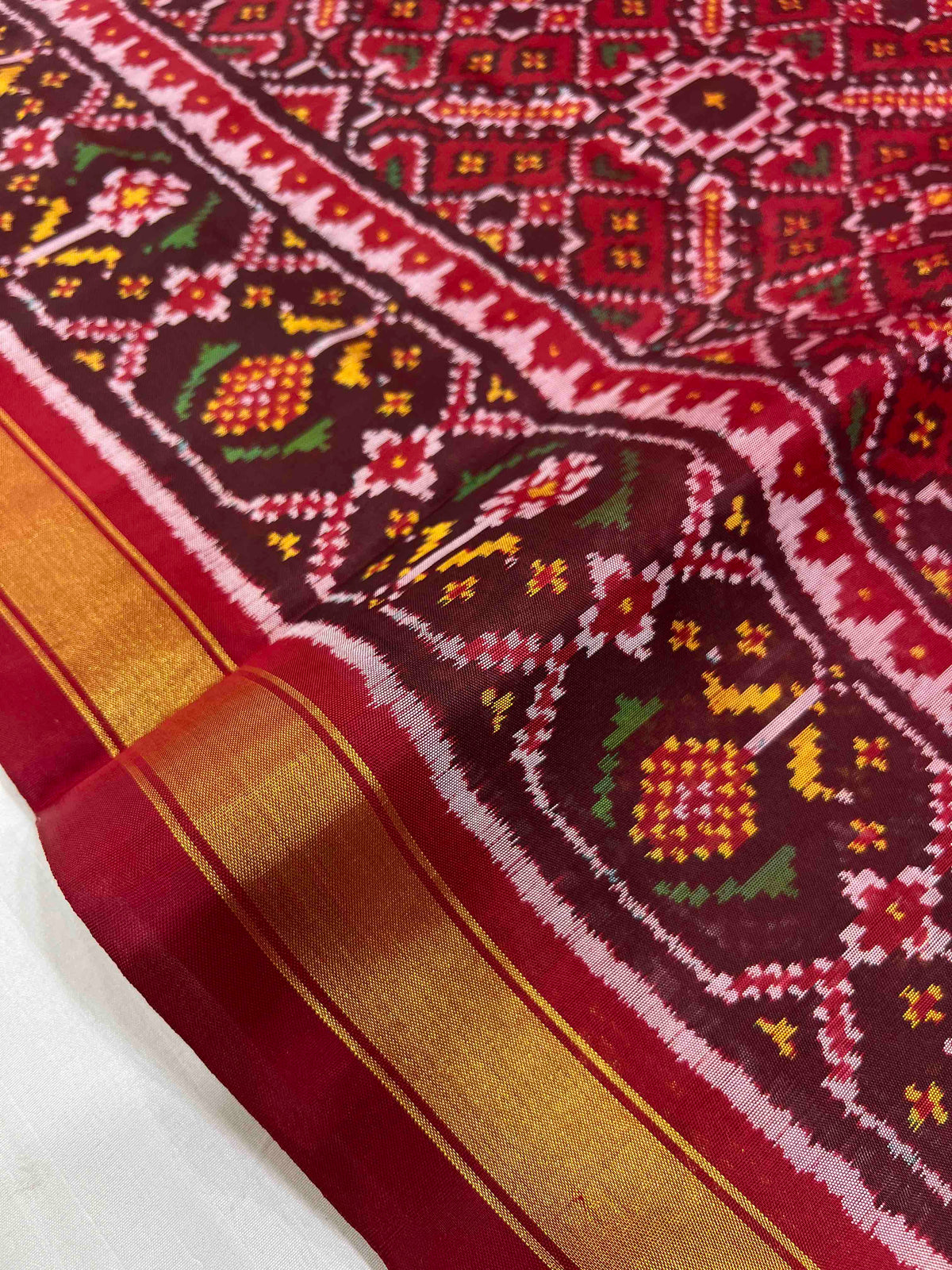 Beautiful Maroon manekchok design single ikkat Patola silk Saree