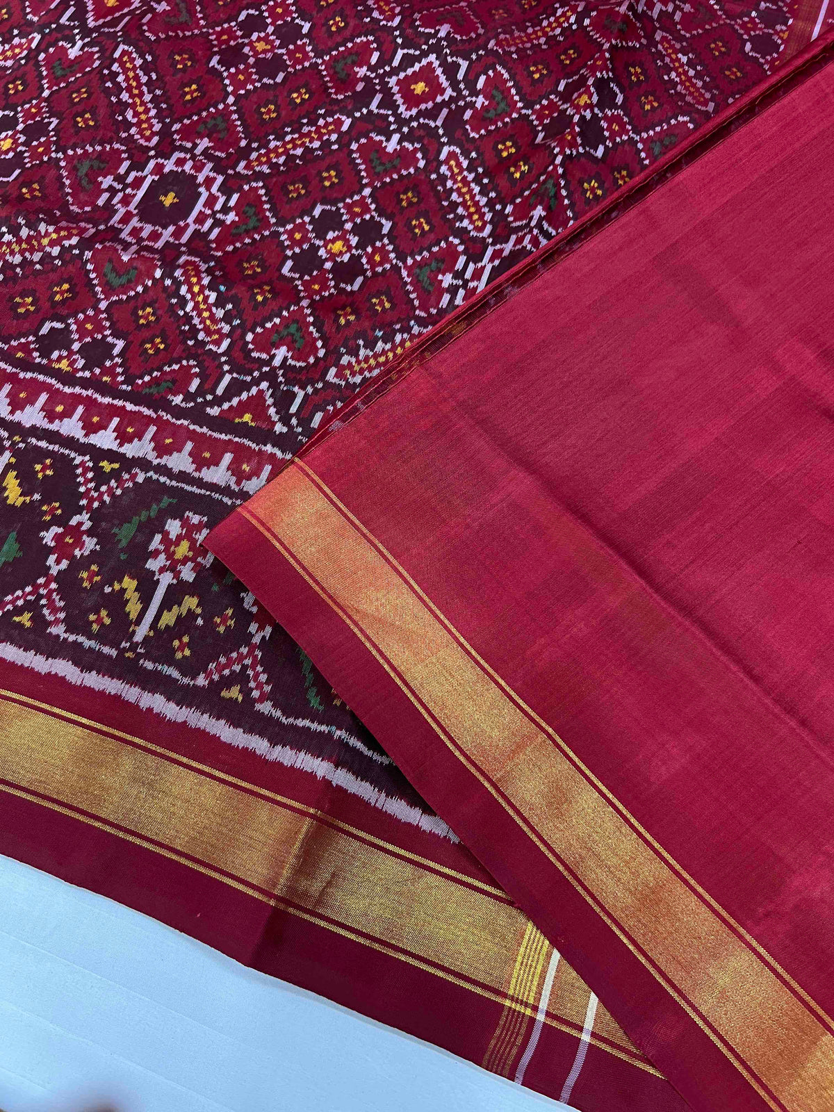 Beautiful Maroon manekchok design single ikkat Patola silk Saree