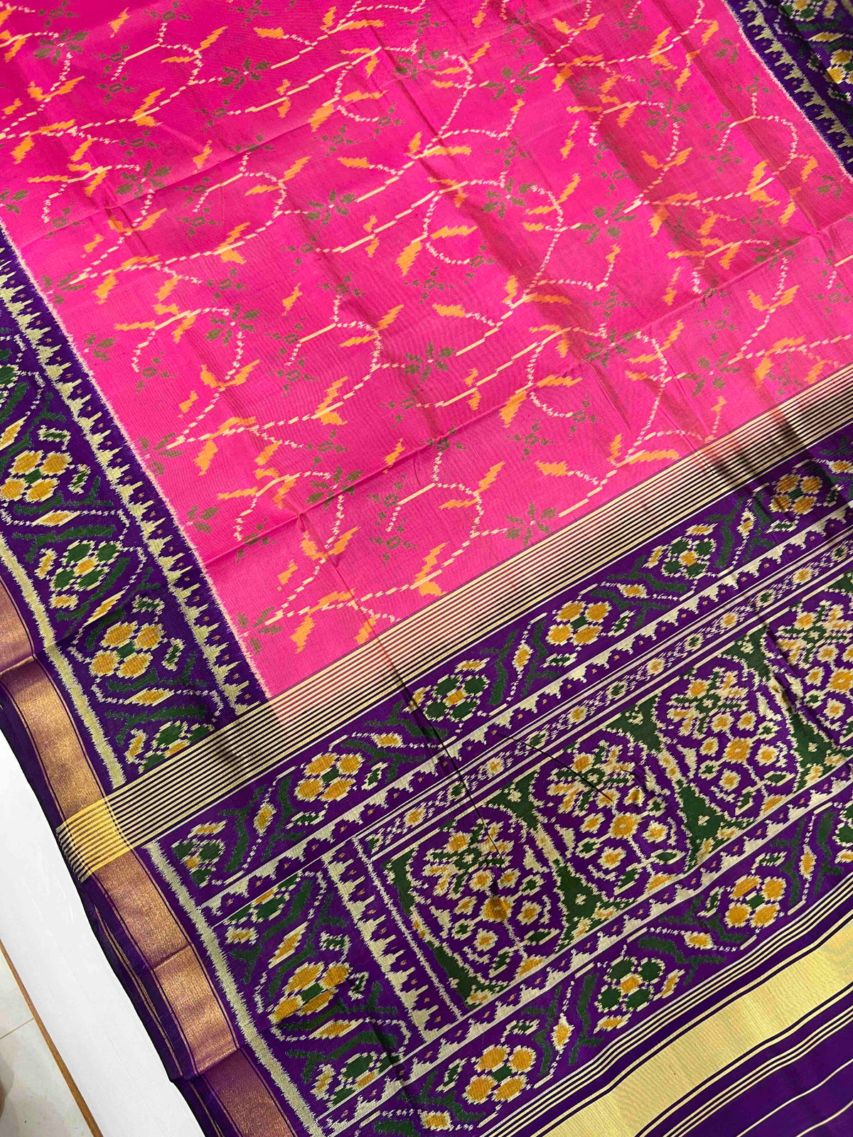 Pink with purple flowers design single ikkat Patola silk Saree