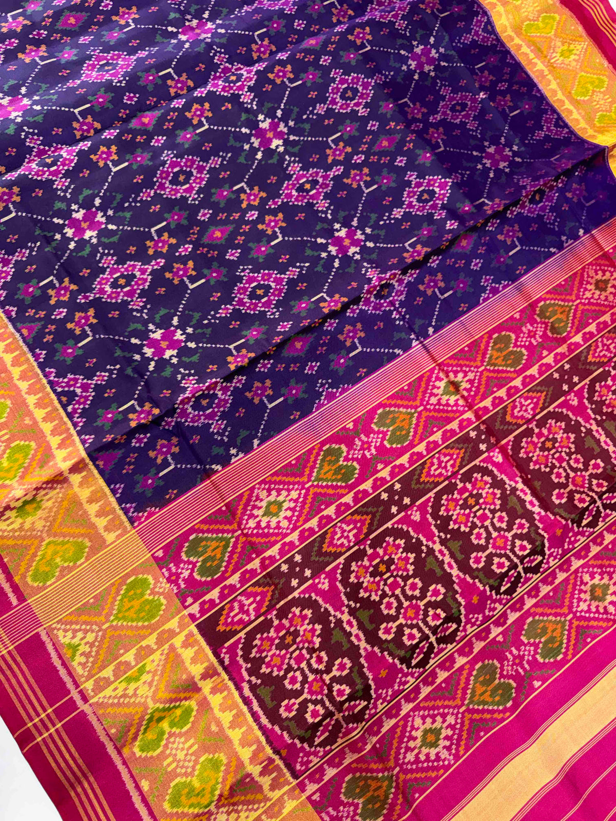 Beautiful blue Navaratan design single ikkat Patola silk Saree