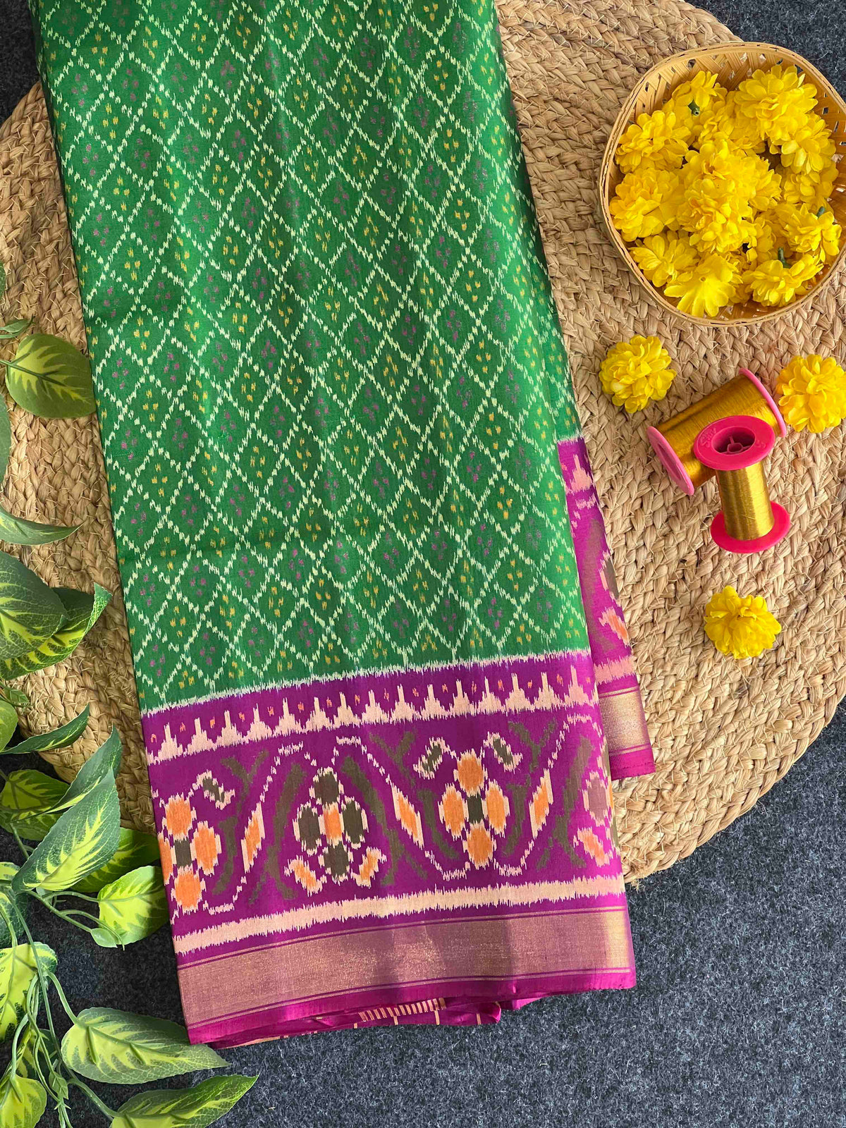 Green daliya bhat design with purple combination Patola silk Saree