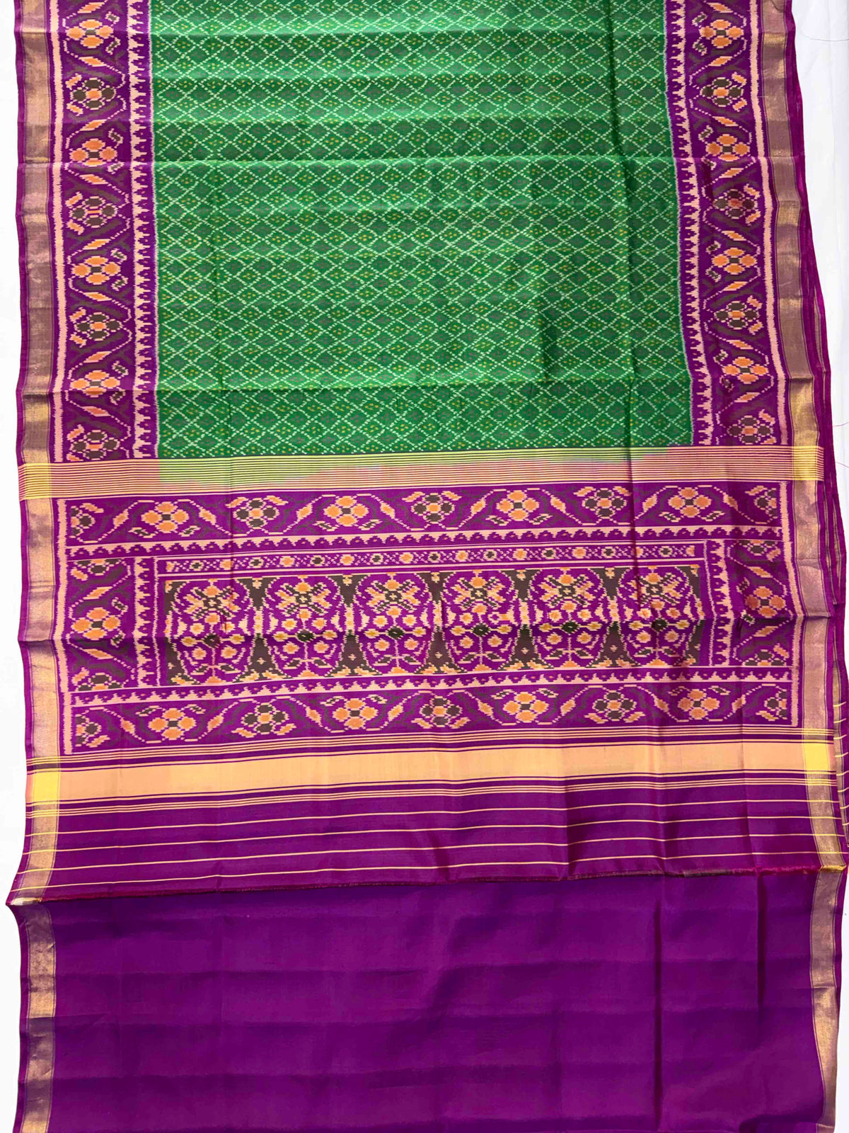 Green daliya bhat design with purple combination Patola silk Saree