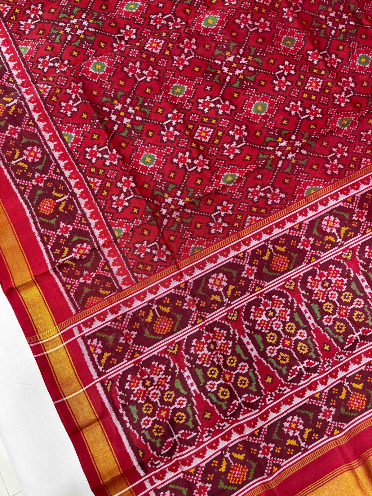 Beautiful maroon Navaratan design single ikkat Patola silk Saree