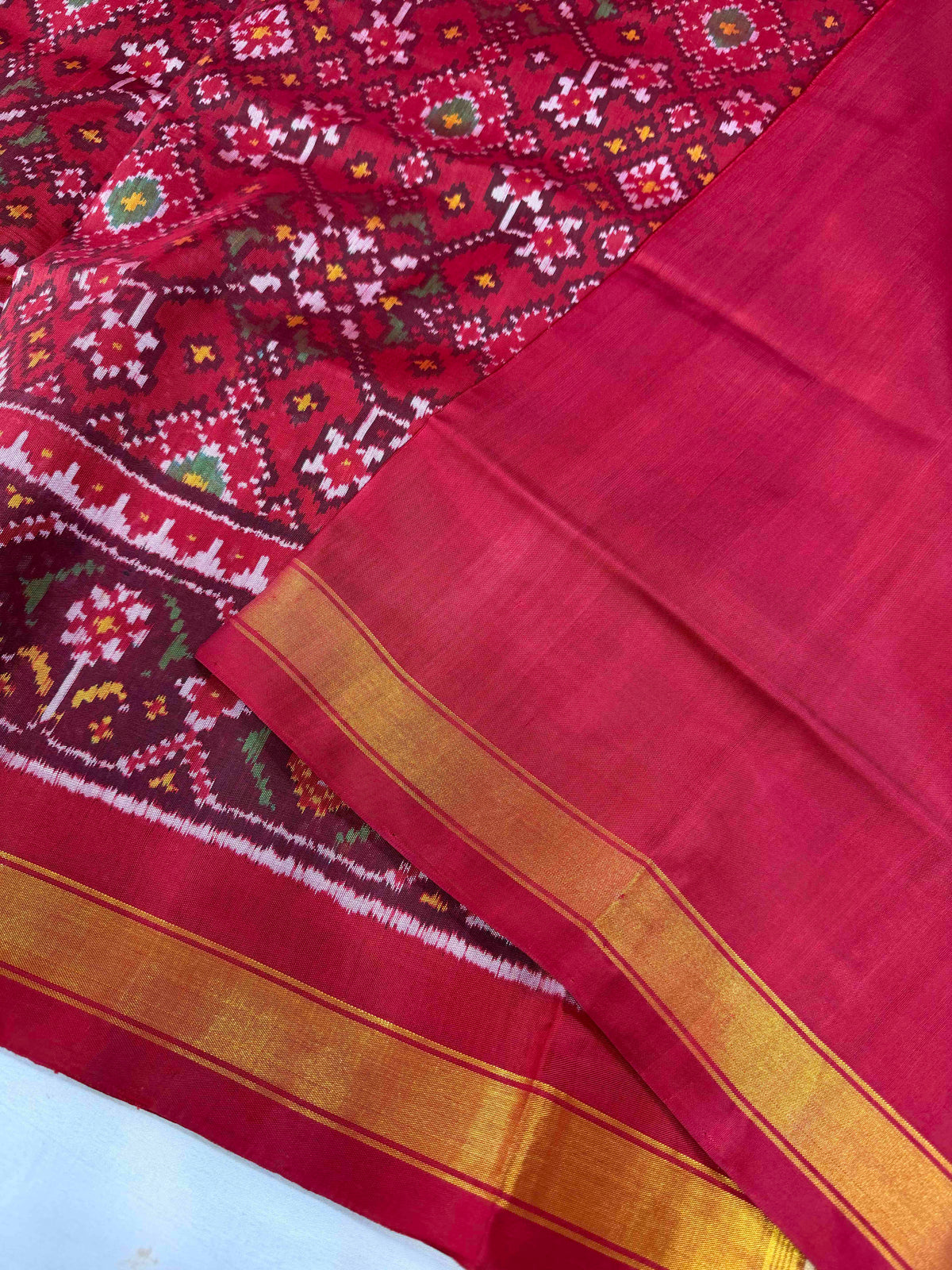 Beautiful maroon Navaratan design single ikkat Patola silk Saree