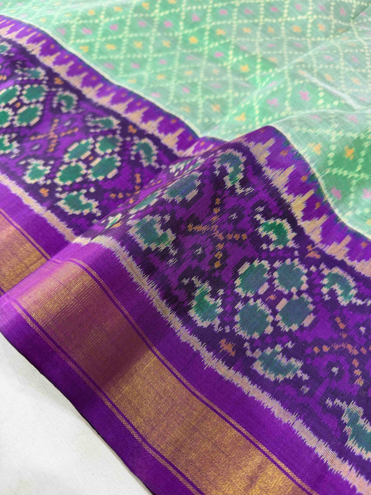 Beautiful pista Green with purple combination Patola silk Saree