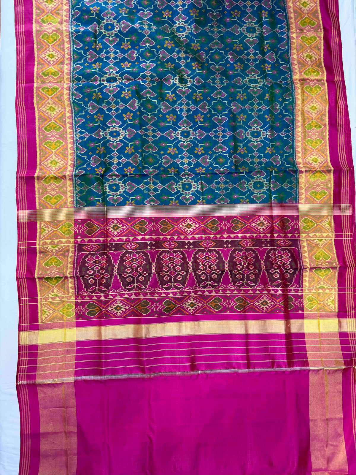Morpiach Navaratan design with pink combination single ikkat Patola silk Saree