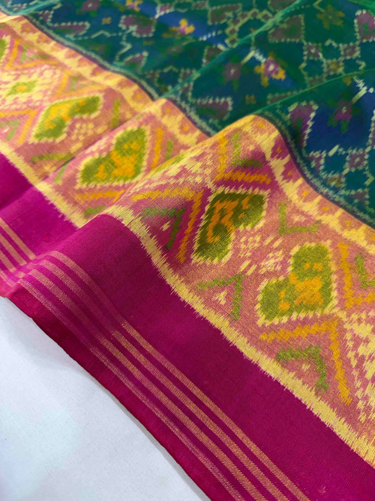 Morpiach Navaratan design with pink combination single ikkat Patola silk Saree