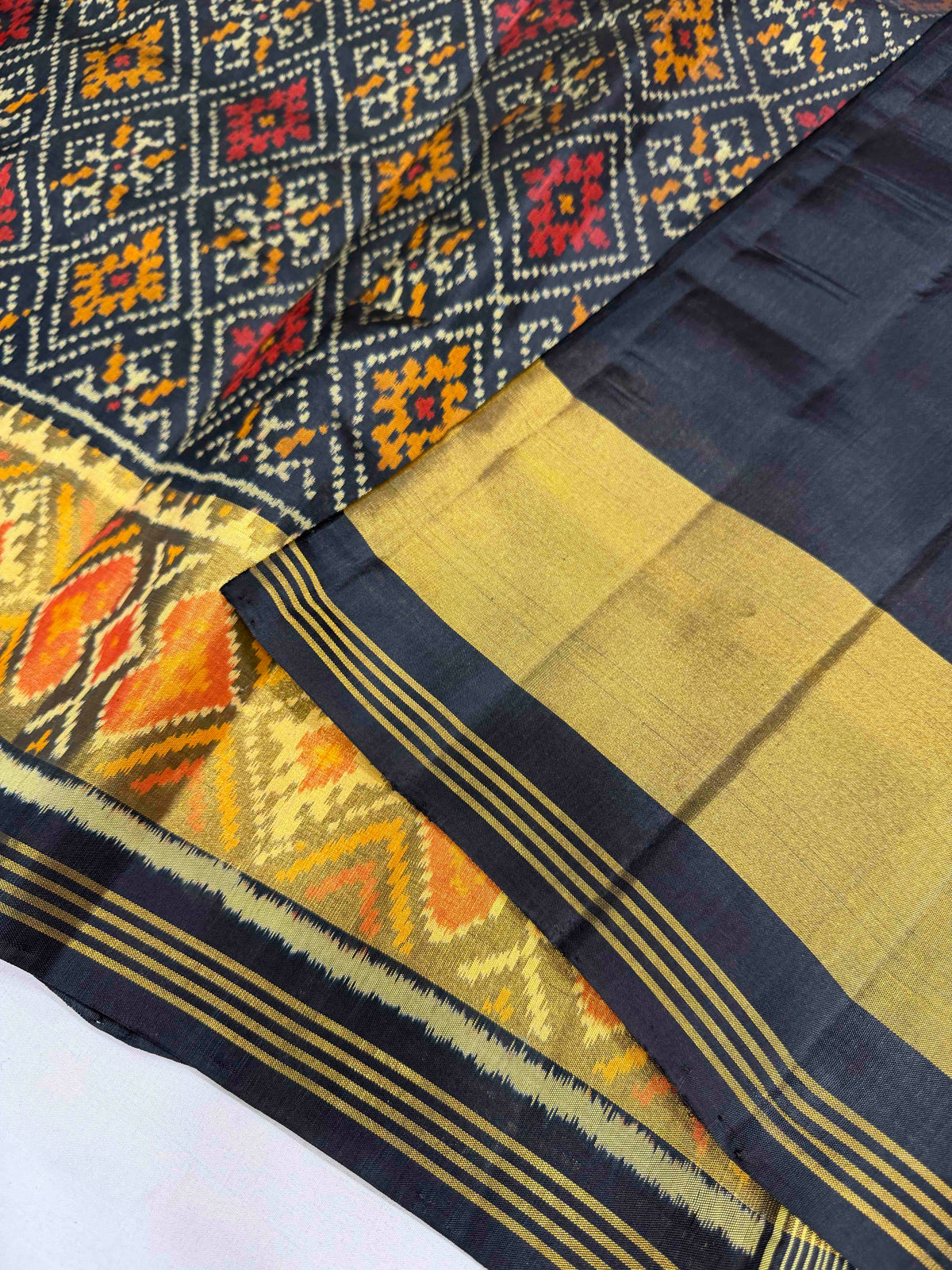 Black panchnanda design single ikkat Patola silk Saree