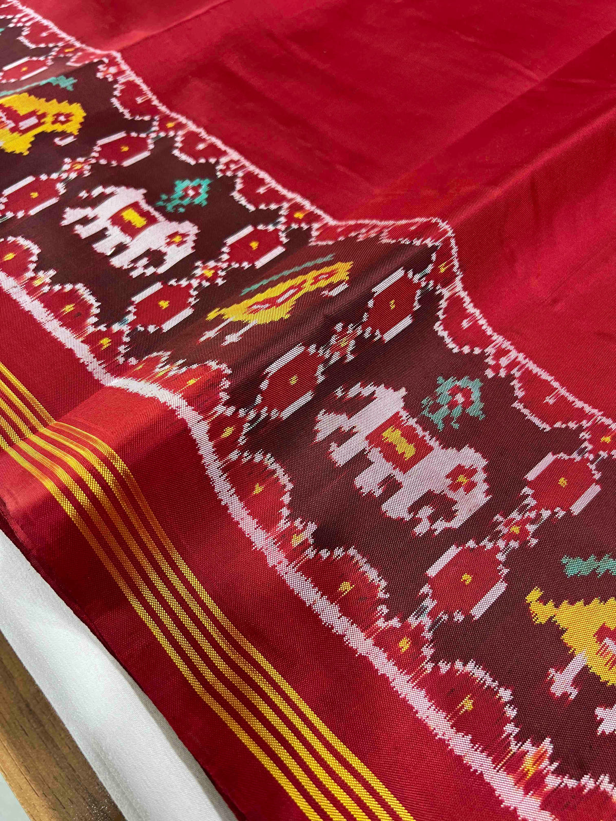 Plain red gala design with flowers Pallu Patola silk Saree