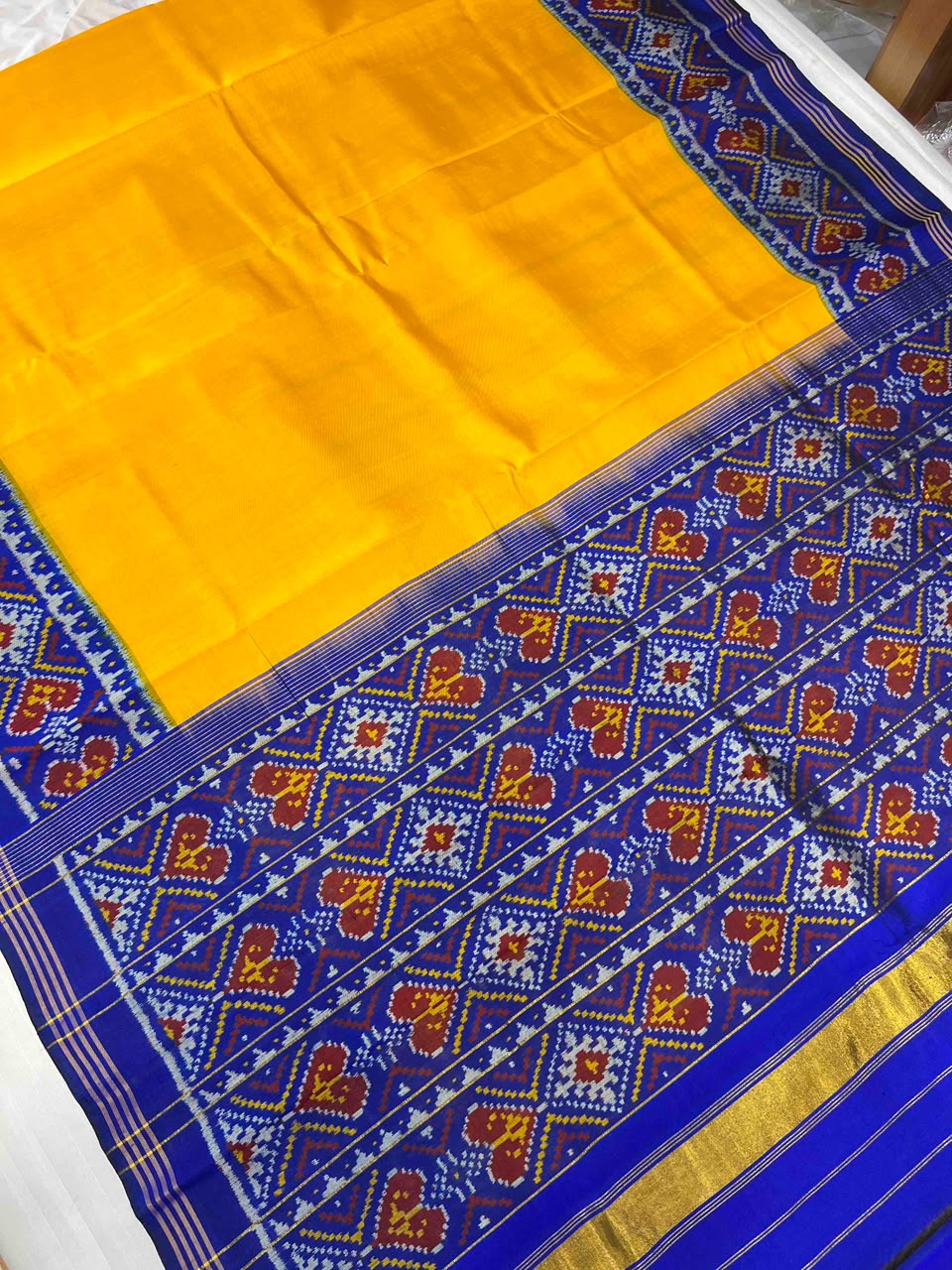 Beautiful yellow and blue singal ikkat silk patola saree