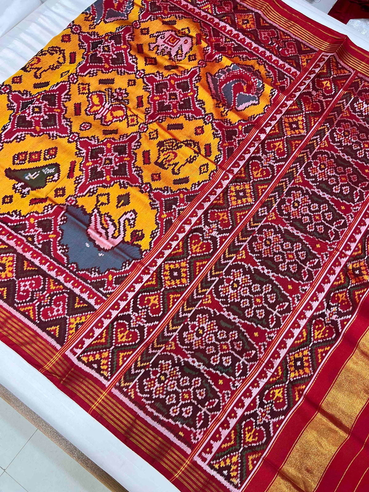 Beautiful yellow patola motifs design patola silk saree