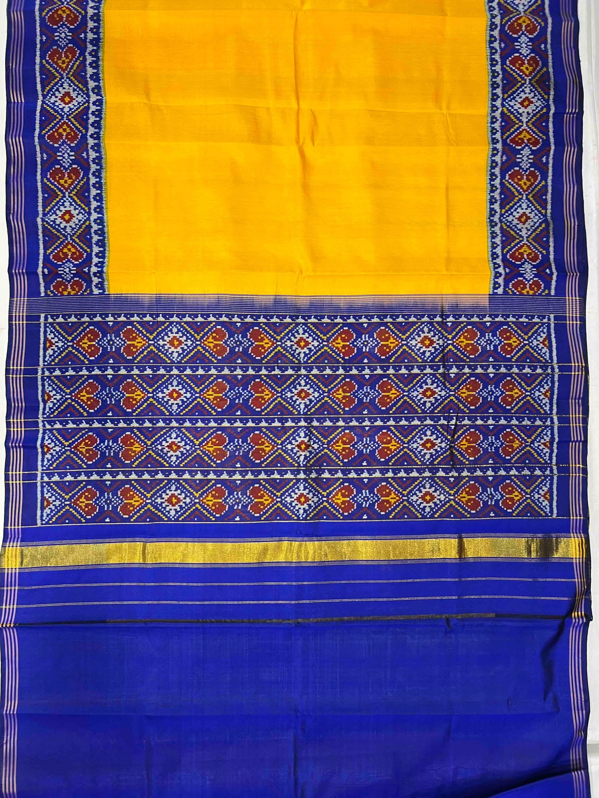 Beautiful yellow and blue singal ikkat silk patola saree