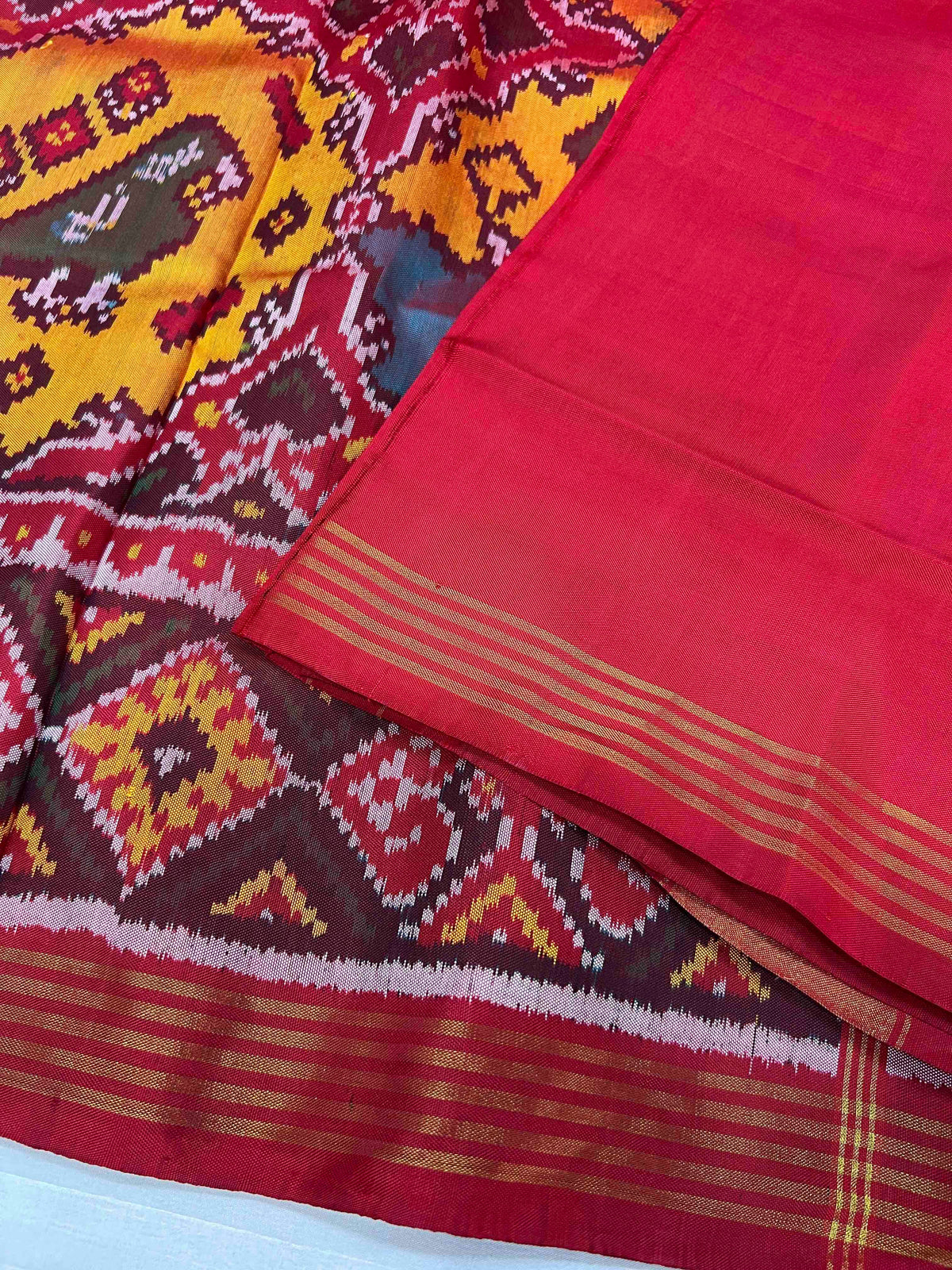 Beautiful yellow patola motifs design patola silk saree