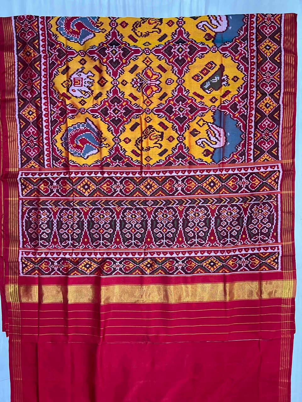Beautiful yellow patola motifs design patola silk saree