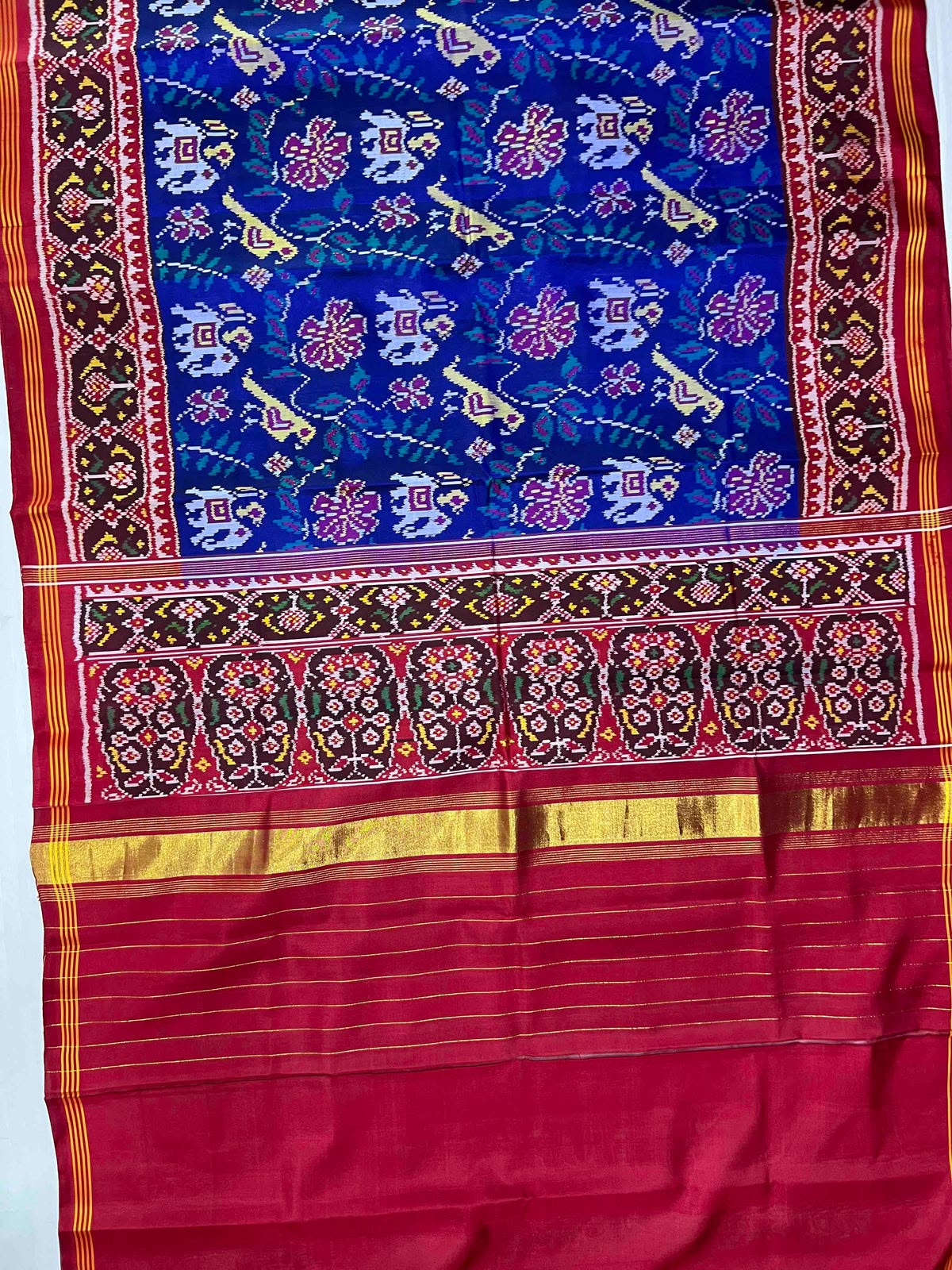 Blue narikunjan design with red Pallu Semi ikkat silk patola saree