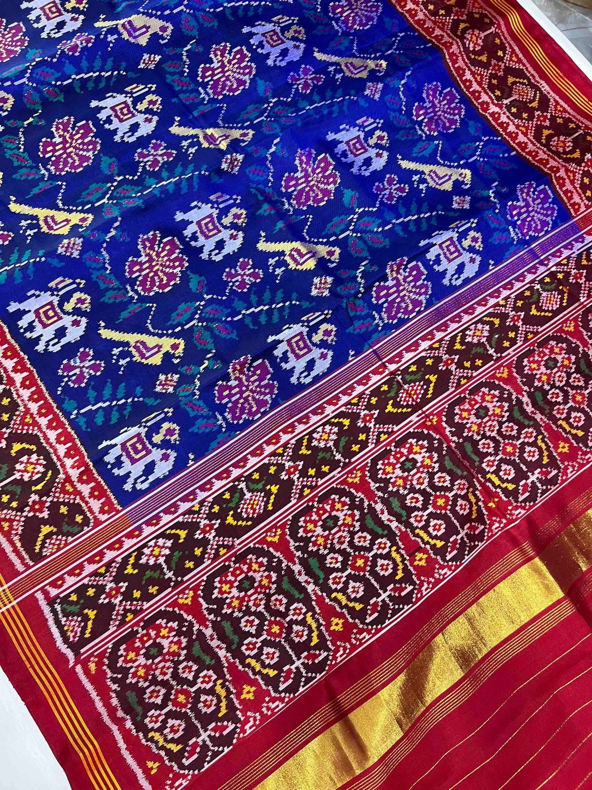 Blue narikunjan design with red Pallu Semi ikkat silk patola saree