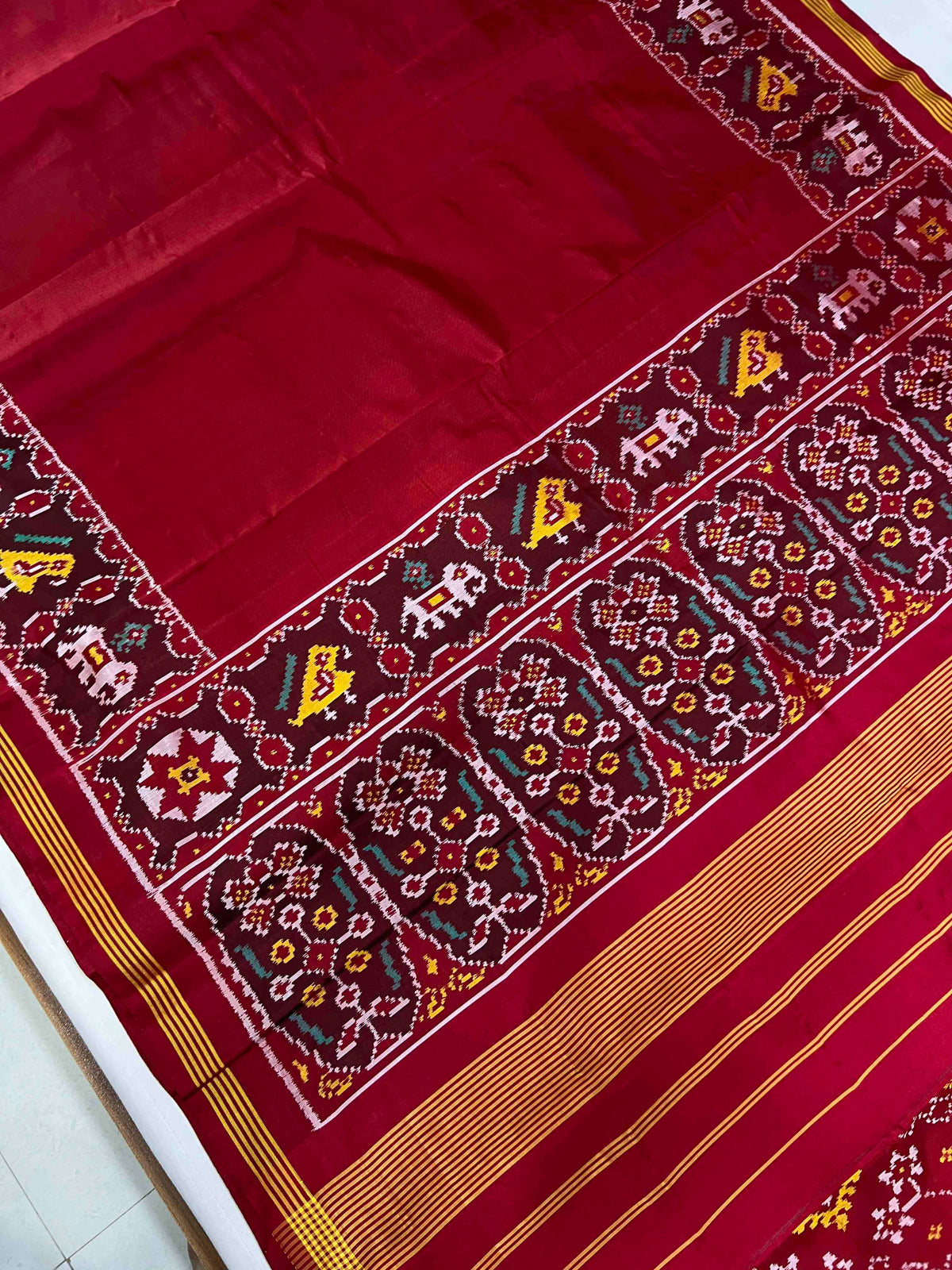 Plain red gala design with flowers Pallu Patola silk Saree