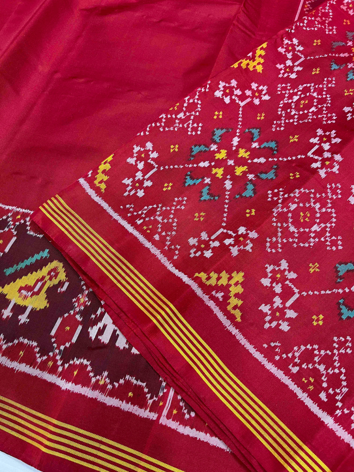 Plain red gala design with flowers Pallu Patola silk Saree